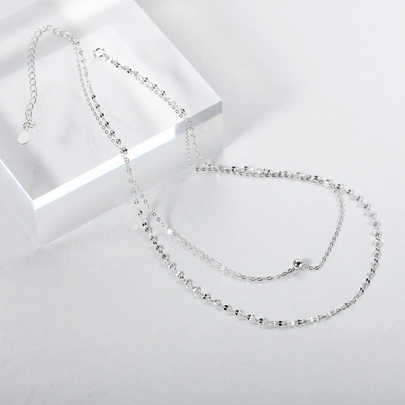 Layered Radiance – Light Beads Double Chain Necklace