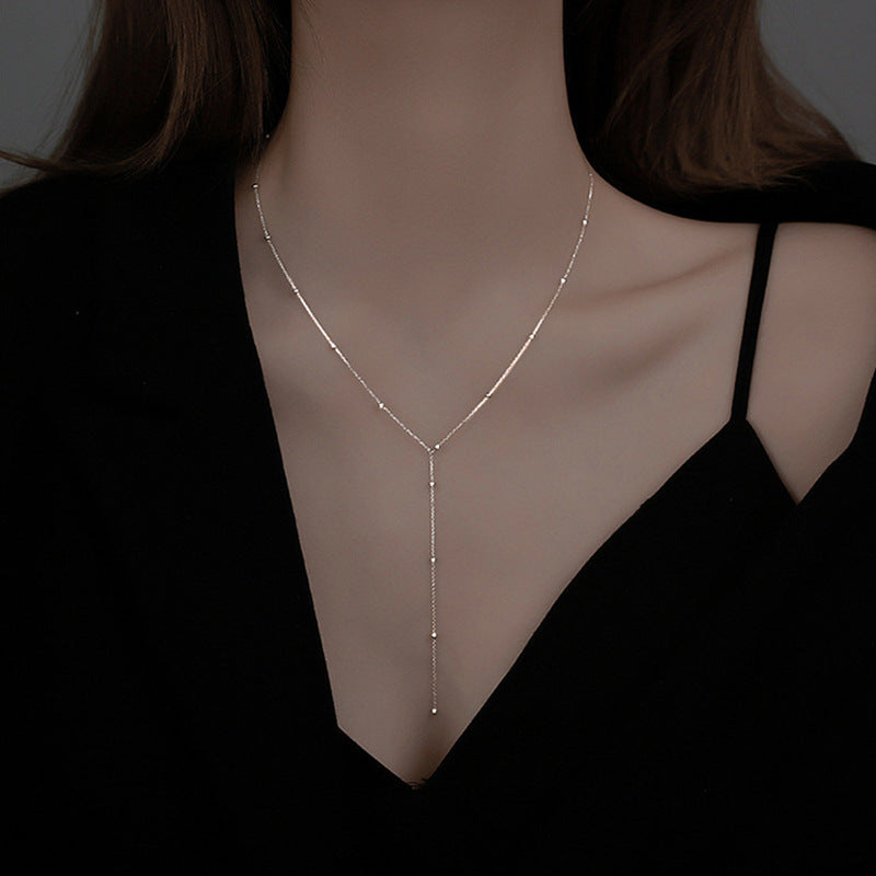 Graceful Cascade – Minimalist Round Beads Long Fringe Necklace Women's Low-cut Cold Style Clavicle Chain