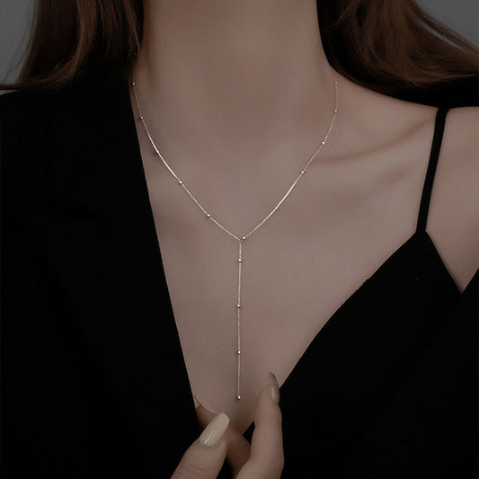 Graceful Cascade – Minimalist Round Beads Long Fringe Necklace Women's Low-cut Cold Style Clavicle Chain